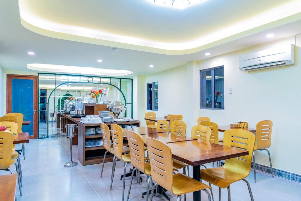 Cosmo Square Hotel Ho Chi Minh City Bagian luar foto