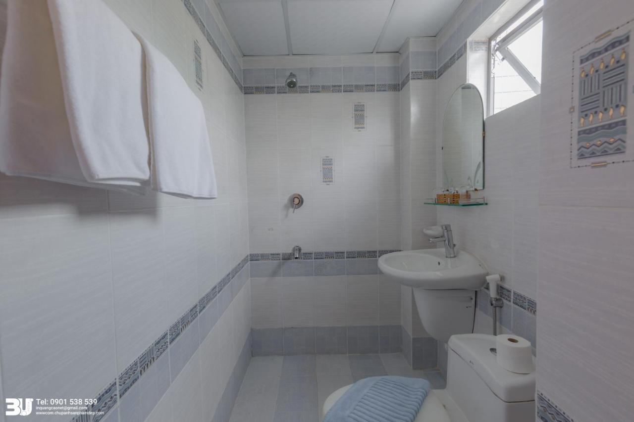 Cosmo Square Hotel Ho Chi Minh City Bagian luar foto