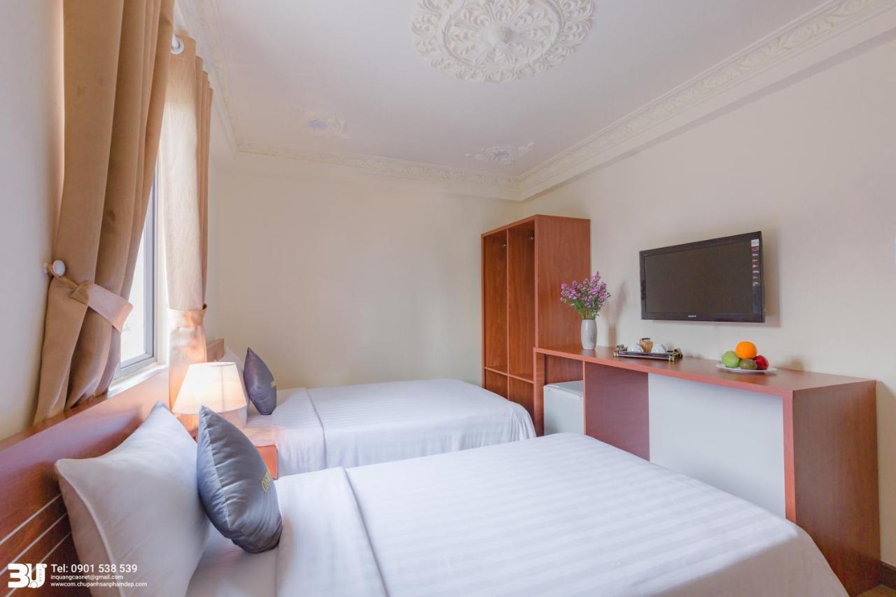 Cosmo Square Hotel Ho Chi Minh City Bagian luar foto