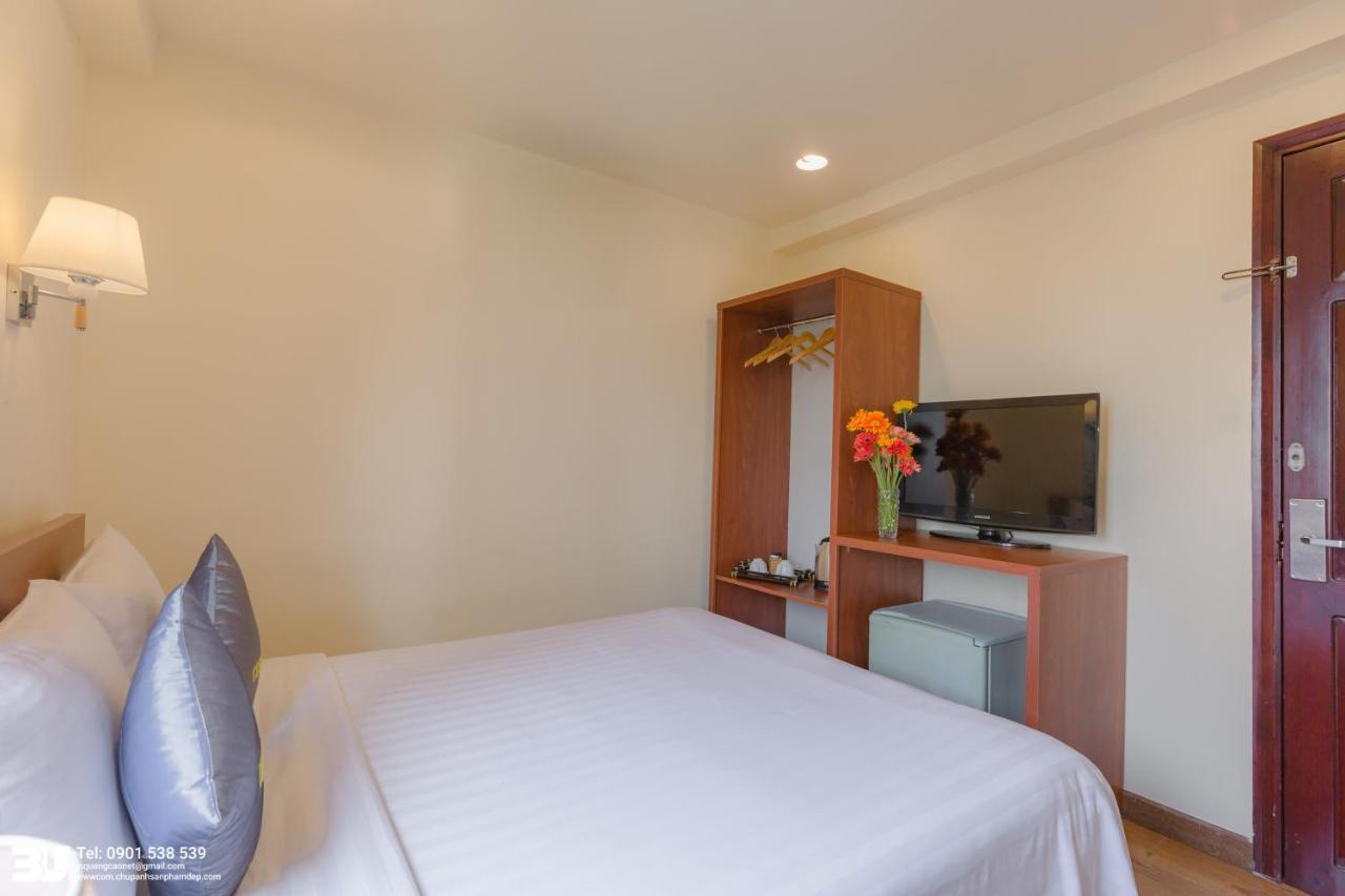 Cosmo Square Hotel Ho Chi Minh City Bagian luar foto